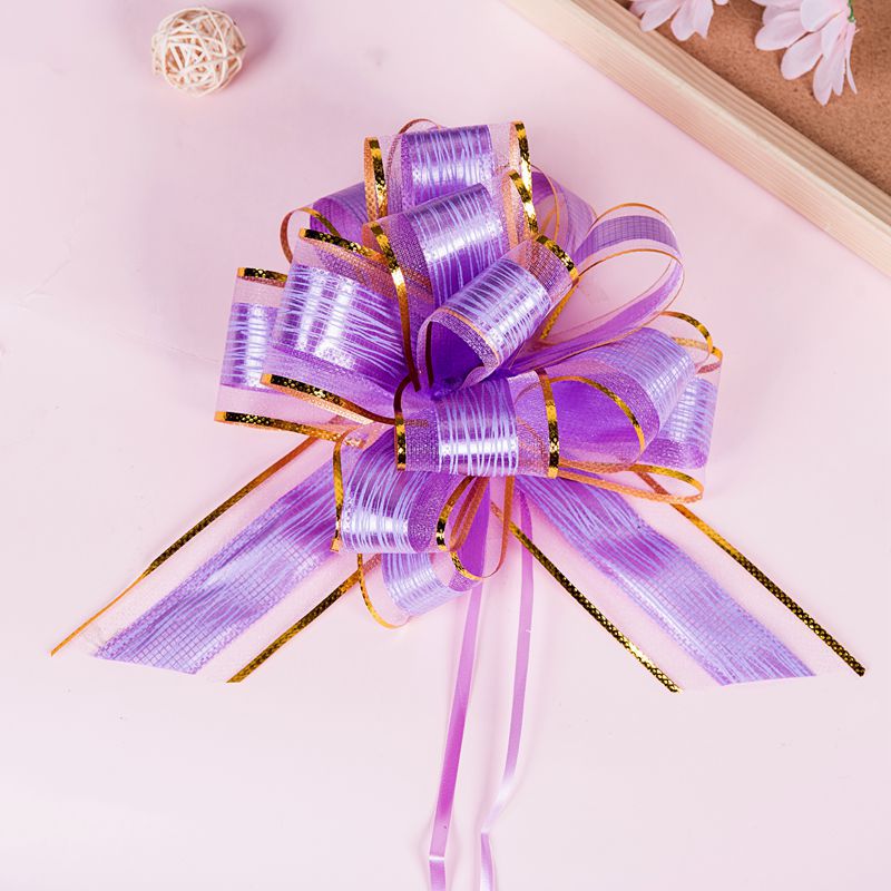 Fábrica directa 50 nuevo hilo de nieve corteza estriado flor de Navidad embalaje de regalos de Hong Kong mano flor perezosa nudo