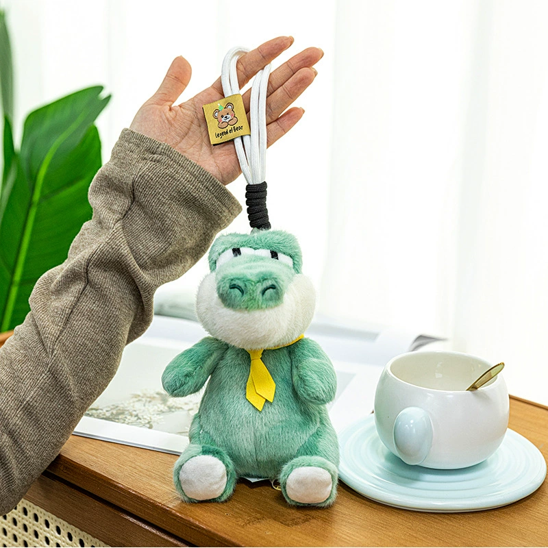 Семейный портрет пальмовое сокровище куклы маленькие животные щенки крокодилы сидят в версии модели, которая может стоять на плечах плюшевых кукол через границу оптом