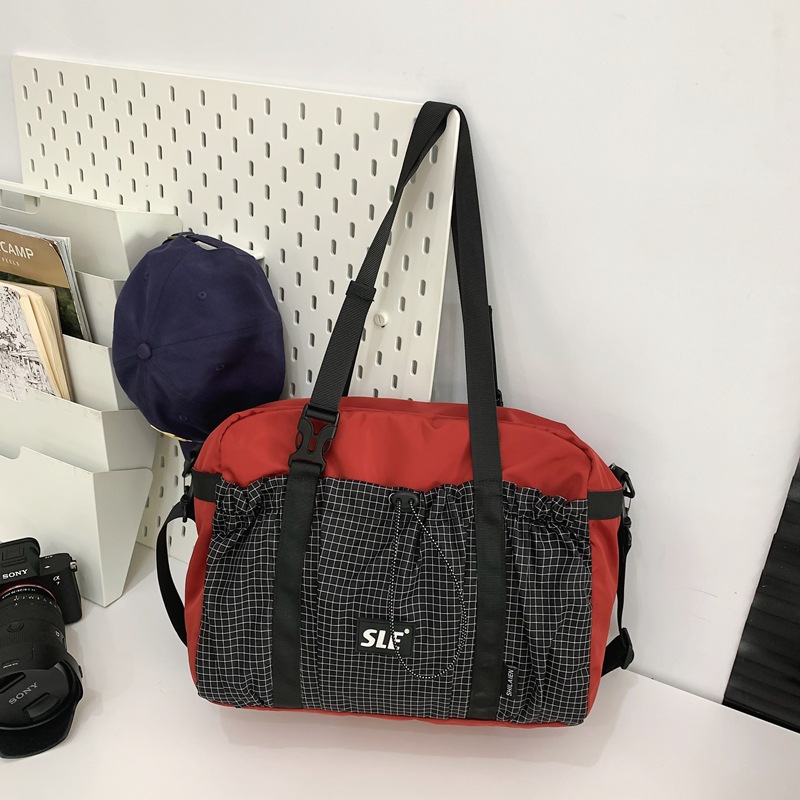 Shake sonido Marvel Tini al aire libre simple estilo de mochila de gran capacidad para hombres y mujeres de color contraste nicho de diseño de tendencia