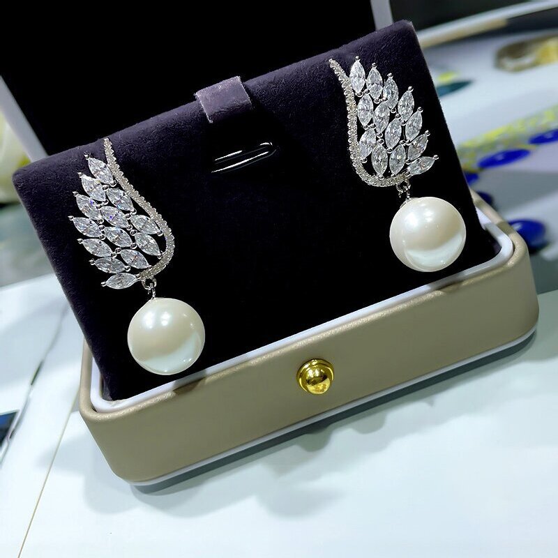 Boucles d oreilles pendantes perle ailes d ange élégantes_voghion.com