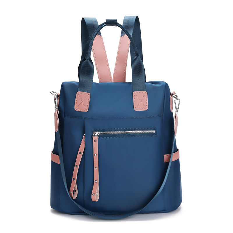 2023 nueva mochila de tela Oxford para mujer casual moda contraste color viaje antirrobo mochila portátil mochila escolar al por mayor