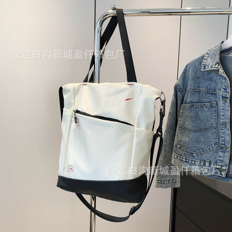 潮牌單肩包女韓版高中大學生原宿大容量電腦托特背包男休閒斜挎包