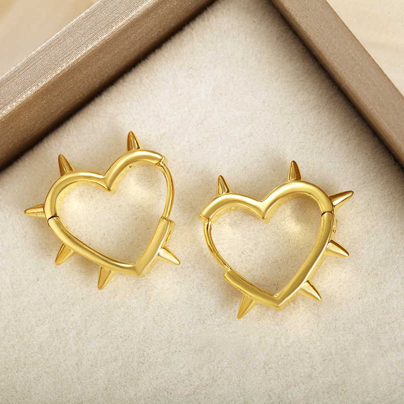 Xuping Cross-border hip-hop personalidad de estilo de amor en forma especial pendientes de orejas de temperamento de alto nivel de nicho mujeres al por mayor