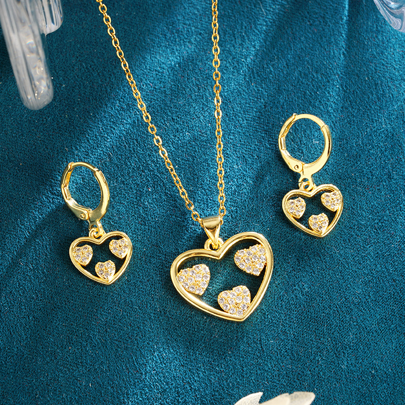 Pendientes de circón de amor hueco de oro de arena de Vietnam, femenino, diseño de nicho, personalidad, collar de temperamento, ventas directas de fábrica