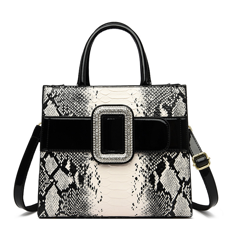 Nueva moda europea y americana todo-fósforo Luz de lujo en relieve patrón de piel de serpiente portátil hombro crossbody bolso de las mujeres