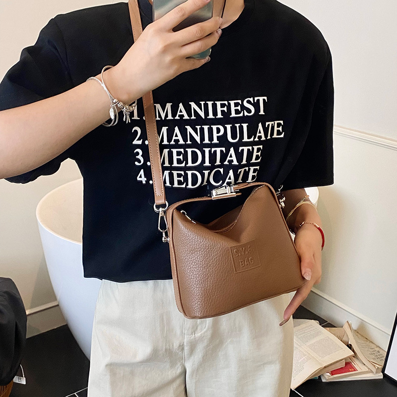 Bolso de moda coreano 2025 verano nuevo bolso femenino retro litchi patrón bandolera simple letra bandolera