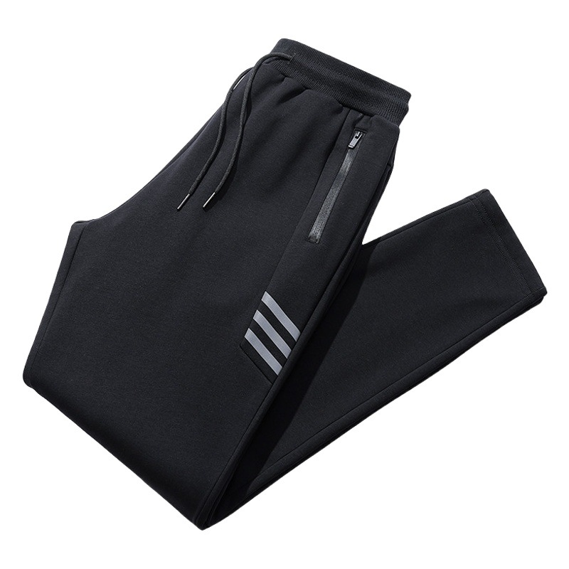 Pantalones deportivos de los hombres de estilo coreano de moda todo partido recto casual pantalones largos juventud suelta tobillo-atado pantalones de chándal Comercio exterior al por mayor