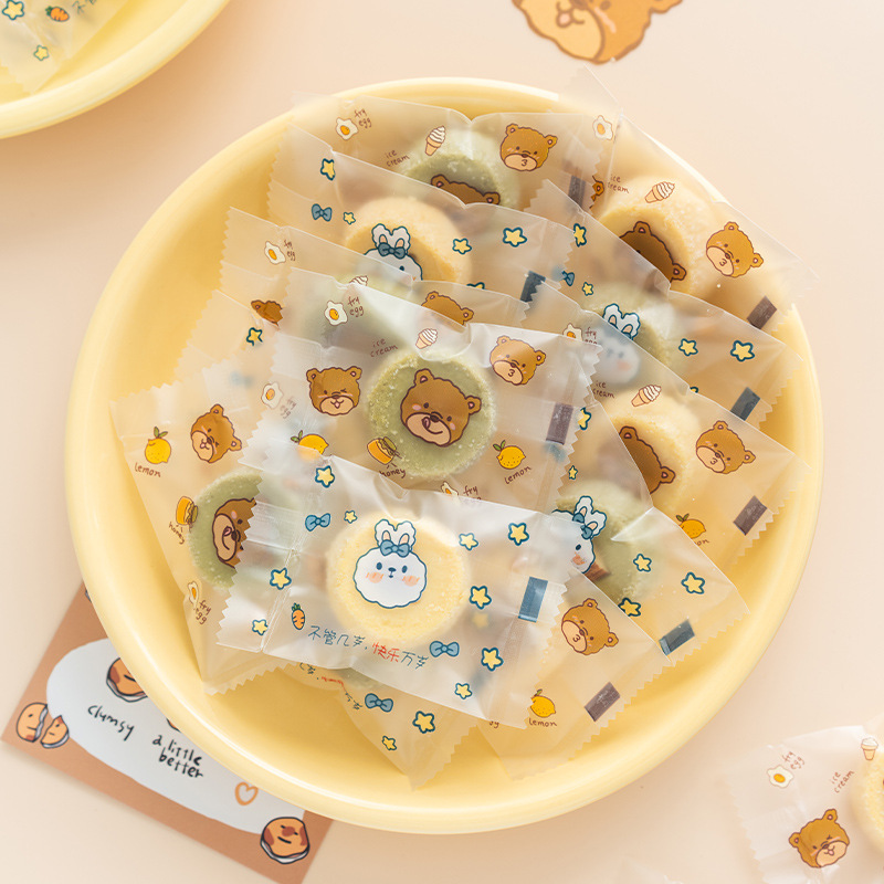 Copo de nieve crujiente bolsa de embalaje galleta máquina de sellado bolsa hornear alimentos turrón leche jujujube pequeña bolsa de caramelo de dibujos animados