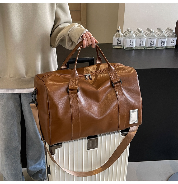 Men's high-end travel bag, large-capacity sports and fitness bag, women's leather travel clothes, luggage bag for men undefined
