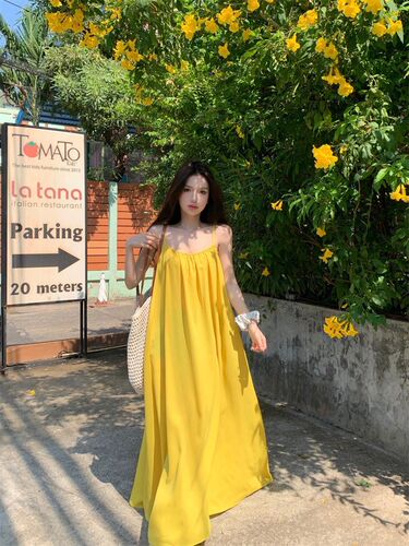 Beach vacation sexy backless suspender dress for women's summer new loose a-line dress gentle yellow long dress