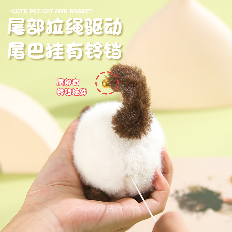 El cable de tracción girará la cola gatito niños llavero campana pequeña colgante puppet muñeca de peluche al por mayor