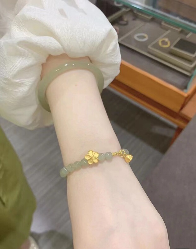 Peach blossom lotus Lotus imitation jade bracelet female simple design niche light luxury round bead bracelet TikTok hot selling factory direct sales Peach blossom lotus Lotus imitation jade bracelet female simple design niche light luxury round bead bracelet TikTok hot selling factory direct sales