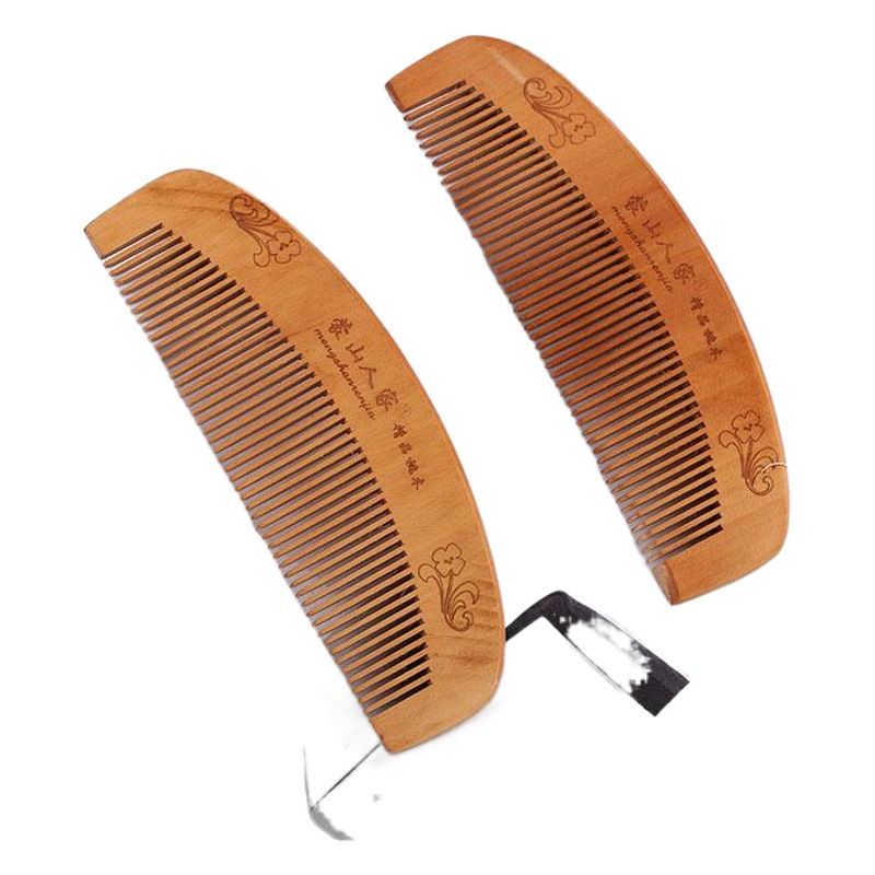 Factory wholesale thickened dense tooth carved peach wood comb head meridian massage household portable with makeup comb