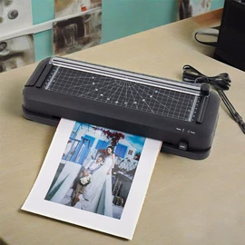 过塑机;裁纸刀;相纸