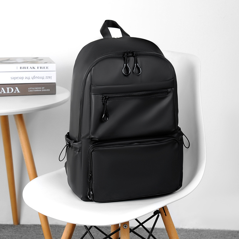 Comercio exterior de los hombres de negocios mochila de cercanías de moda de alta calidad bolsa de estudiante de la escuela secundaria impermeable fabricante mochila de la computadora