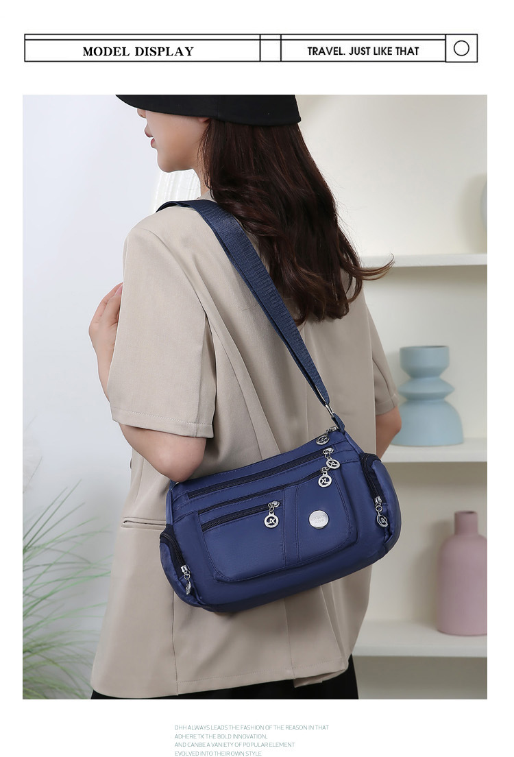 A new popular women's crossbody bag with multiple layers made of Oxford fabric, fashionable, casual and trendy. It's a single-shoulder bag for middle-aged and elderly mothers undefined