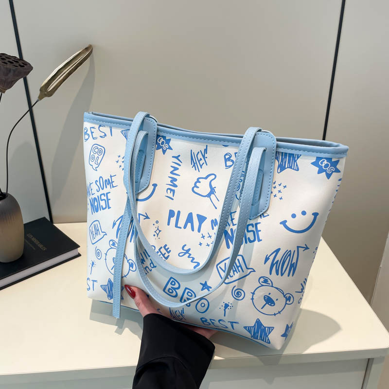 Bolso para axila de gran capacidad 2024 otoño e invierno nuevo bolso de hombro con estampado de dibujos animados lindo bolso de arte dulce