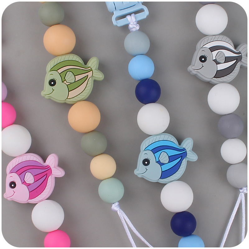 Nuevo bebé suministros chupete cadena creativa bebé dibujos animados pescado silicona mordedura molar anti-gota cadena