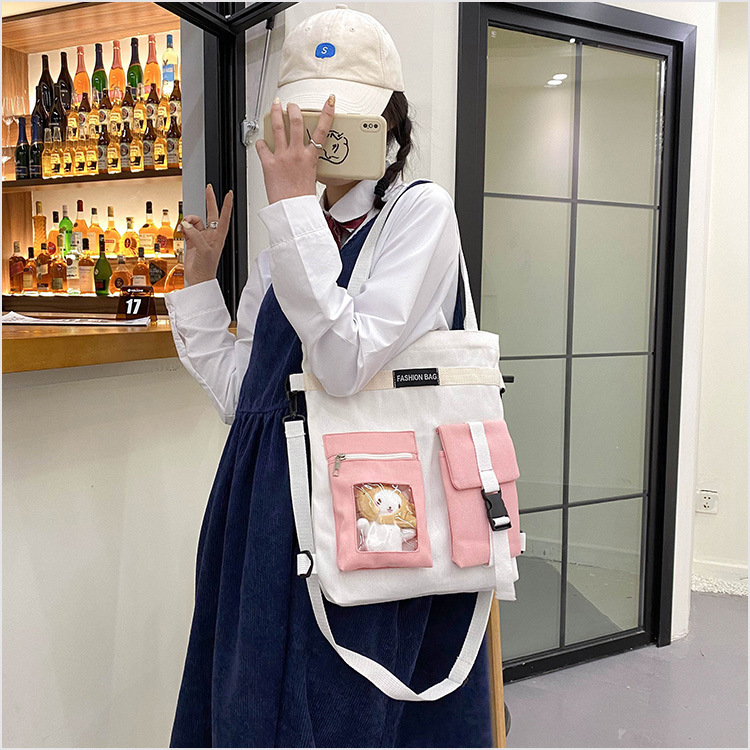 Factory wholesale 2021 new Korean-style canvas handbags, large-capacity multi-functional student cloth bags, four-use bags undefined