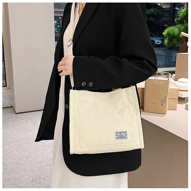 257g Weight Polyester Lining Material Sewing Thread Fashion Element Zipper Closure Type Single Shoulder Strap, Top Handle Strap Type Square Bag Bags Type Casual Occasion Canvas Material Solid Color Pattern All Seasons Season Women's Gender Streetwear Style Square Shape Women's Canvas Solid Color Streetwear Sewing Thread Square Zipper Square Bag 25
