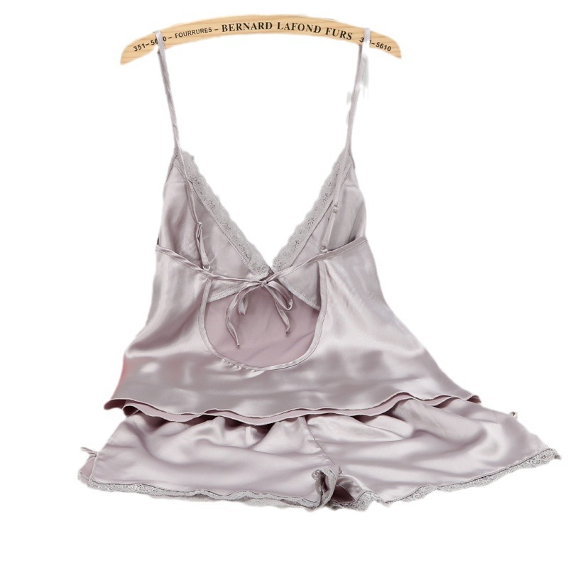 春の夏のストラップのパジャマの女性のセクシーな氷の糸の2つのセットはシルクの短い吊り下げの半ズボンの大きいサイズの薄い部屋の服を詰めます。