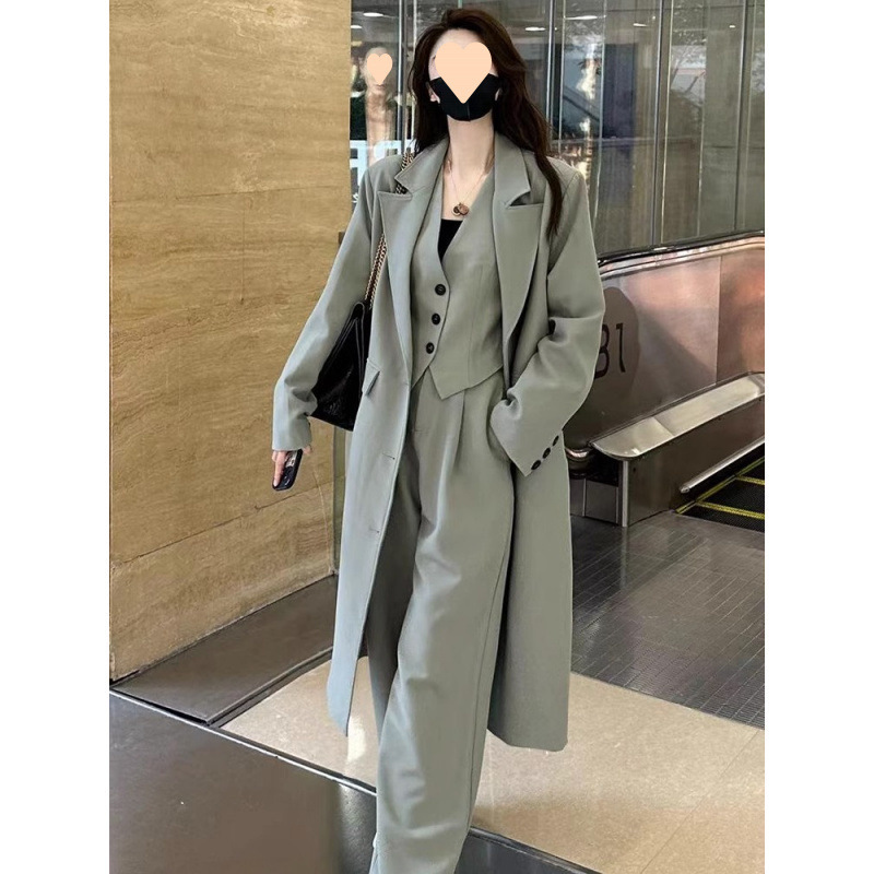 ゆったりとした高級感のあるスーツの女性の秋の純色の単列は馬甲の広い足のズボンの3つのセットの女性のコートの風衣を掛けます。|undefined