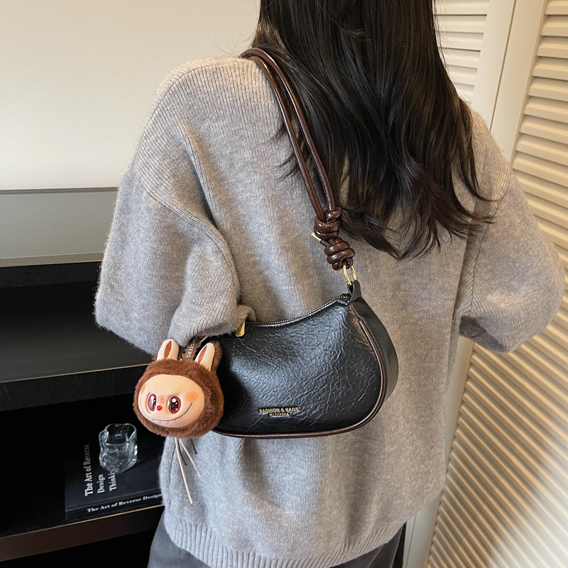 Bolsa de cuero de seda retro, bolsa de media luna, mujer 2025, nuevo estilo de lujo ligero de alto nivel, bolsa de cuero de hombro inclinada.