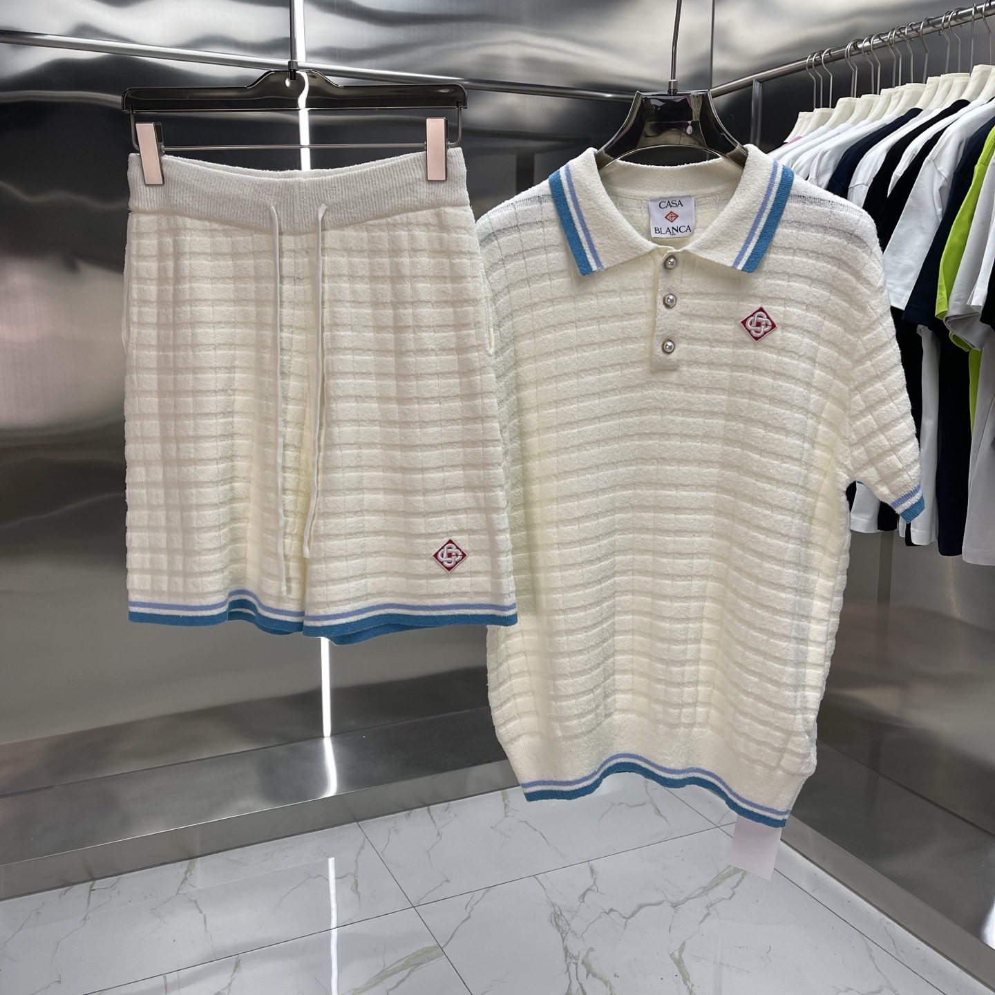 Comercio exterior casa Casablanca suéter suéter de manga corta jacquard cardigan polo pareja pantalones cortos traje