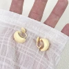 Yellow mosquito coil, ear clips