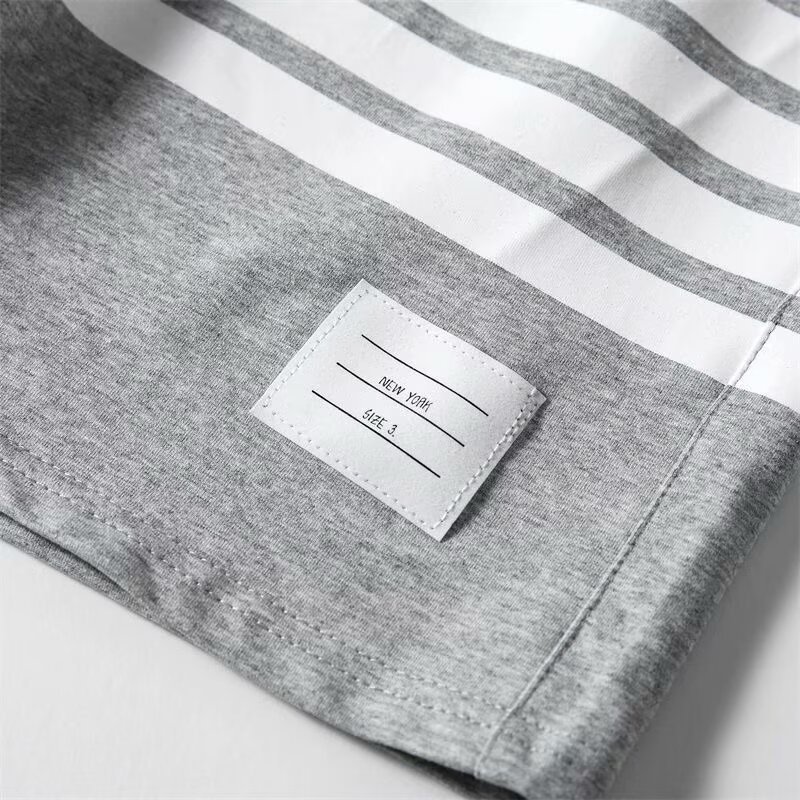 Pantalones de hombre de verano nuevos pantalones de hombre casuales transpirables pantalones cortos delgados marca de moda de tamaño grande suelto cuatro barras deportivas