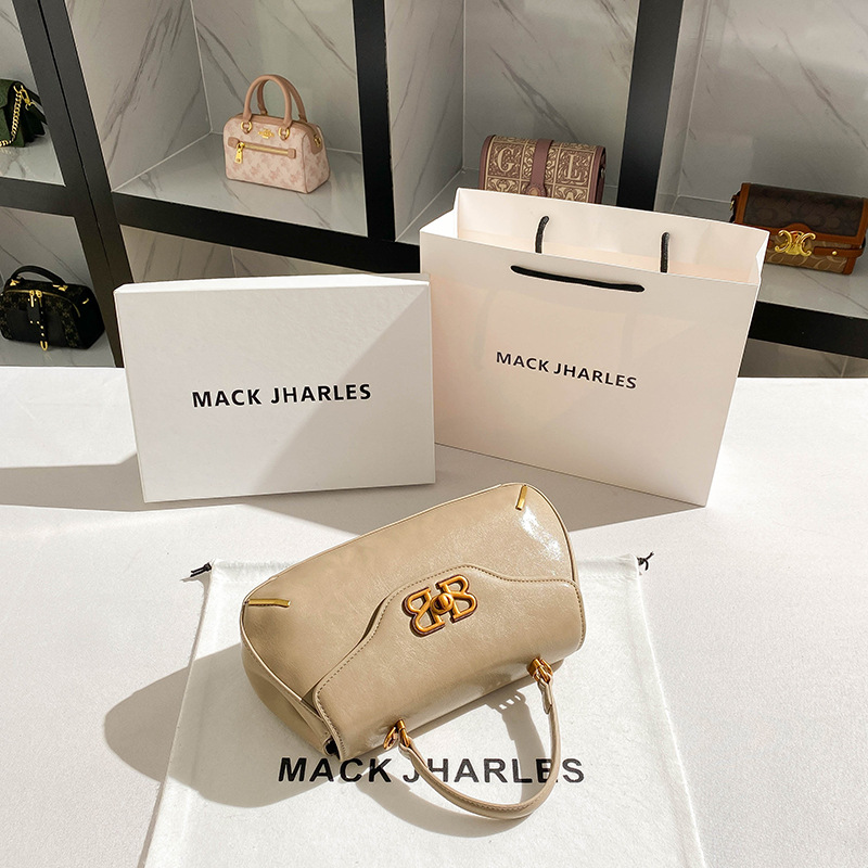 Una bolsa de silla de lujo ligera de nicho 2024 nueva bolsa de mano retro de alta calidad al por mayor