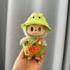 Green teapot, dinosaur, pendant, overall