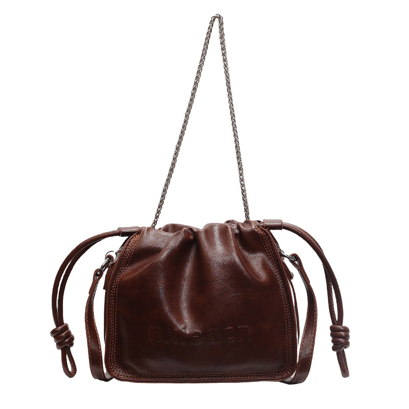 Bolso de explosión de moda plegado para mujeres 2025, nuevo bolso de piel de cera de aceite de estilo universal, bolso casual simple de hombro bajo la axila