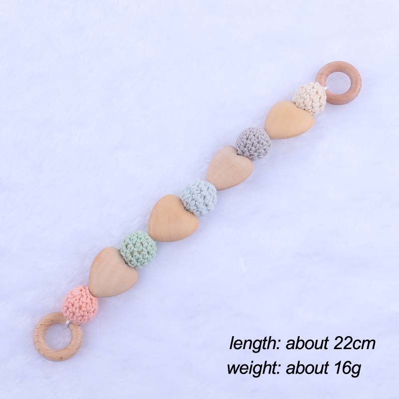 Nueva historieta del bebé haya amor mordedor juguete DIY macaron gran bola de lana mordedura pulsera