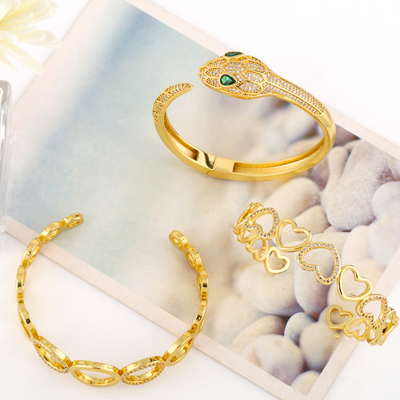 Fashion snake-shaped geometric heart-shape circle hollow copper inlaid zircon bracelet wholesale