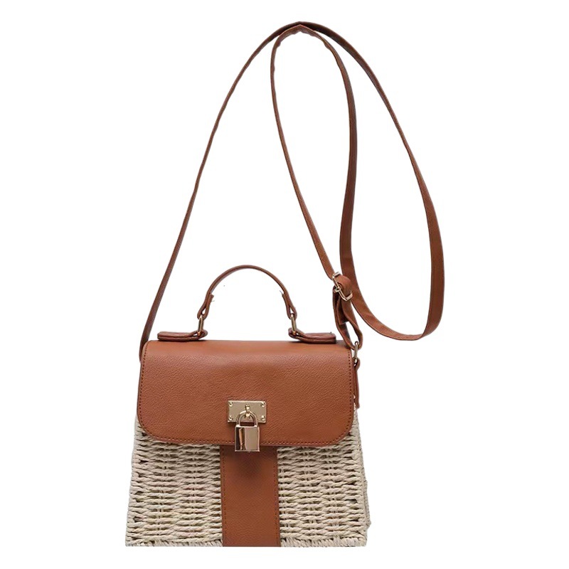 Bolsa de paja de diseño de nicho para mujeres 2023 nueva moda en línea popular bolsa de mensajero portátil pequeña bolsa cuadrada