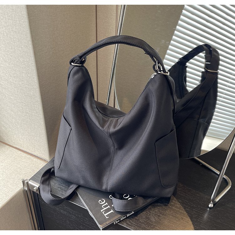 Solo bueno, vale la pena llevar sus hombros, resistente al desgaste, gran capacidad, elegante y ligero