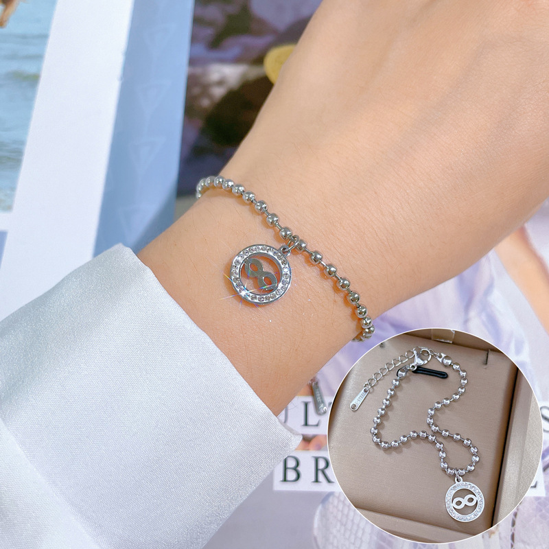 Bracciale donna con perline rotonde personalizzato in acciaio_voghion.com