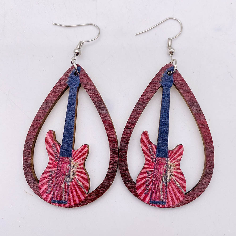 1 Pair Retro Guitar Water Droplets Wood Hollow Out Women's Drop Earrings display picture 4