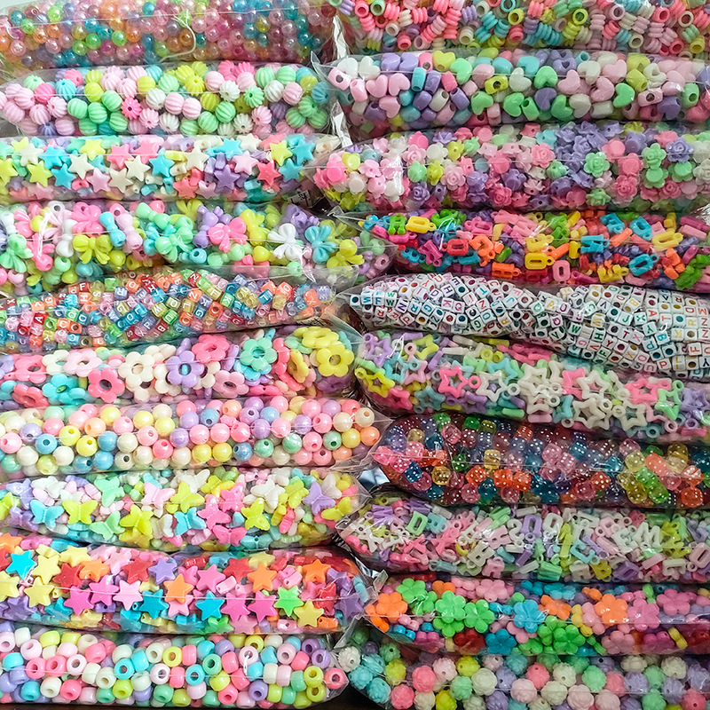 Cuentas acrílicas transfronterizas niños puzzle cuentas DIY material de mano collar pulsera cuentas de color de forma especial