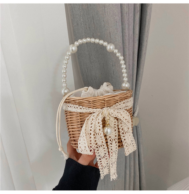 Fashion Round Straw Pearl Portable Bag display picture 11