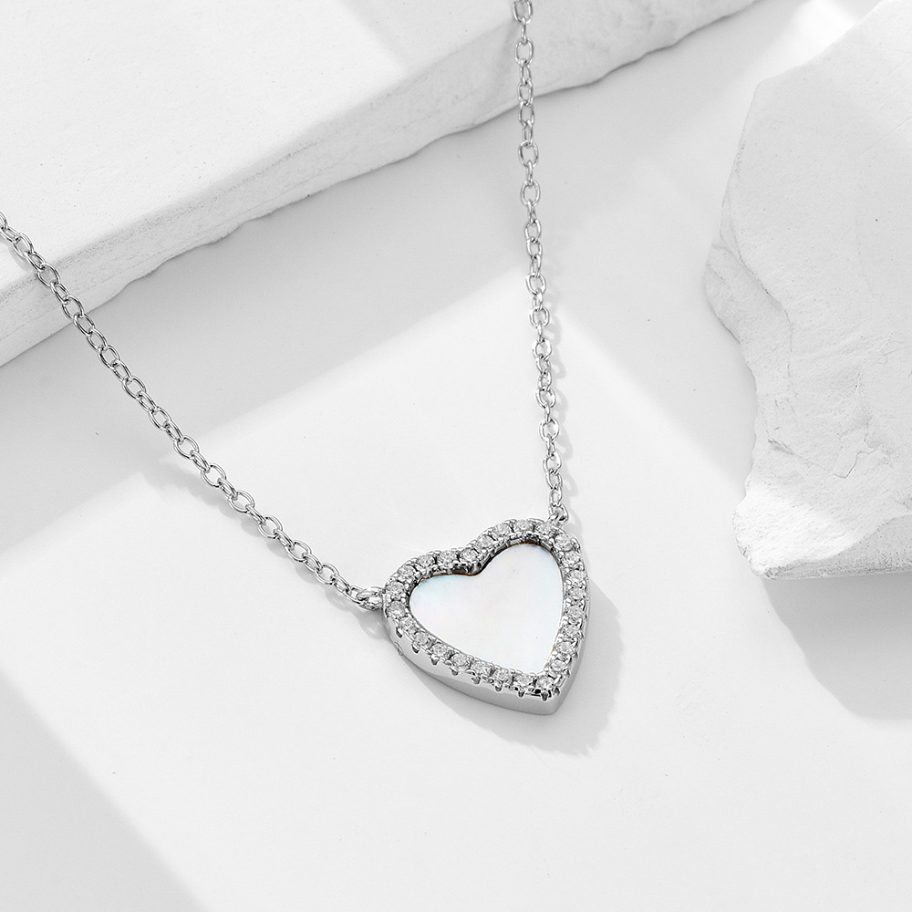 S925 collar colgante de concha en forma de corazón de amor de plata de ley femenino europeo y americano, lujo ligero, cadena de clavícula de todo fósforo con incrustaciones de diamantes de alta gama