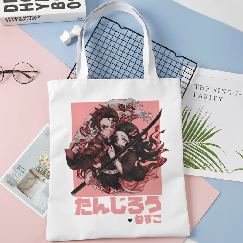 Comercio exterior transfronterizo Demon Slayer impresa bolsa de lona Harjuku bolsa de hombro bolsa de compras portátil de moda para estudiantes