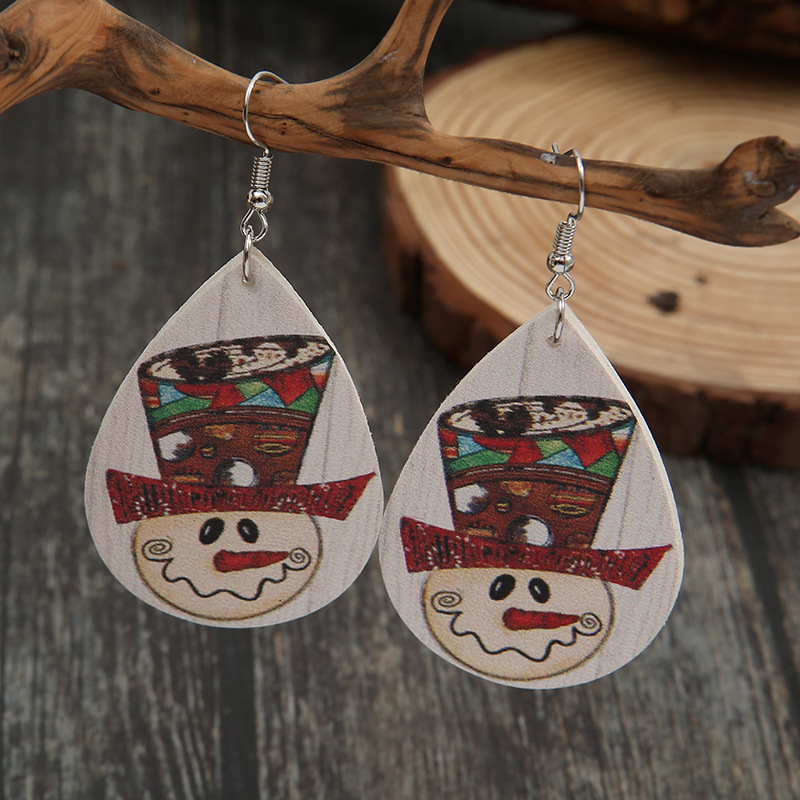 Independent Station New Christmas Water Drop Cartoon Snow Leather Earrings Cute Smiley Face Pu Earrings Wholesale display picture 1