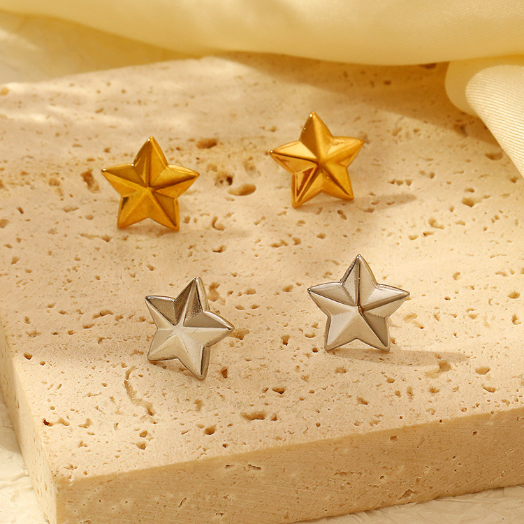 Europa y América tendencia estereoscópica penta-star de acero inoxidable moda femenina alta sensación chapado orejas de oro 18K