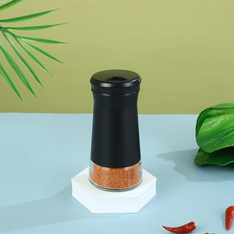 Fábrica al por mayor botella de condimento de vidrio de acero inoxidable cocina esparcidor de pimienta porosa giratoria sal de mar