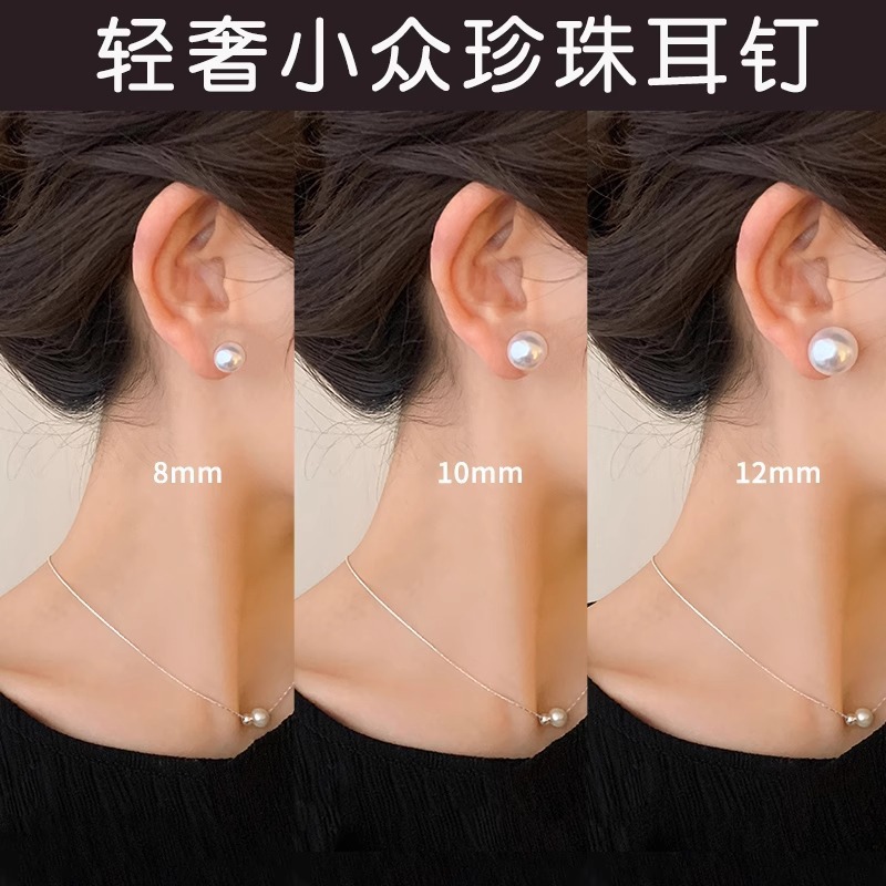 Pendientes de borla simples de Corea del Sur Pendientes de perla de imitación de temperamento de lujo ligero de nicho de alta gama Pendientes de puesto femenino al por mayor