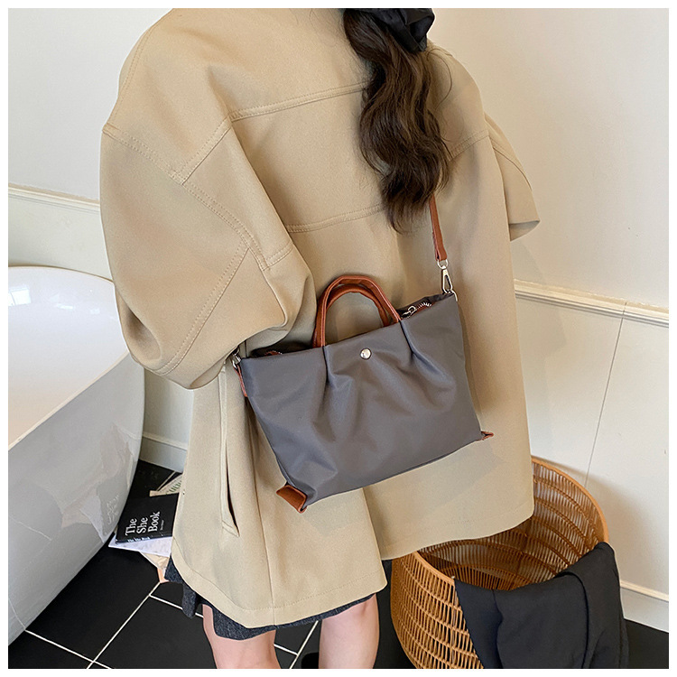 Borsa a tracolla casual da donna in tessuto Oxford, capiente, elegante e versatile, ideale per gli spostamenti quotidiani._voghion.com