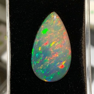 11.75 karat Opal Black Opal Surface Naked Stone Colorful Rainbow Fire Colors Flash