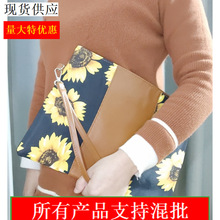 跨境包包批发女士豹纹手拿包太阳花女包黑白黑红格手抓包信封手拿